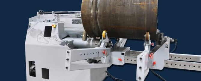 SweBend JM-140 joggling machine with a heavy-wall steel cylinder showing rolled circumferential stiffening grooves