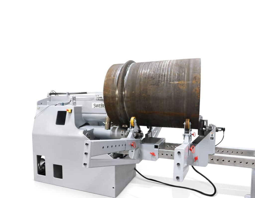 SweBend JM-140 joggling machine with a heavy-wall steel cylinder showing rolled circumferential stiffening grooves