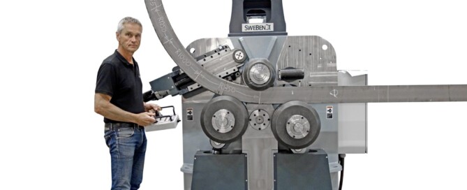 SweBend SB3X-140 section bending machine run from the Wireless Bluetooth Control while spiraling a 150 x 30 mm S355 flat bar